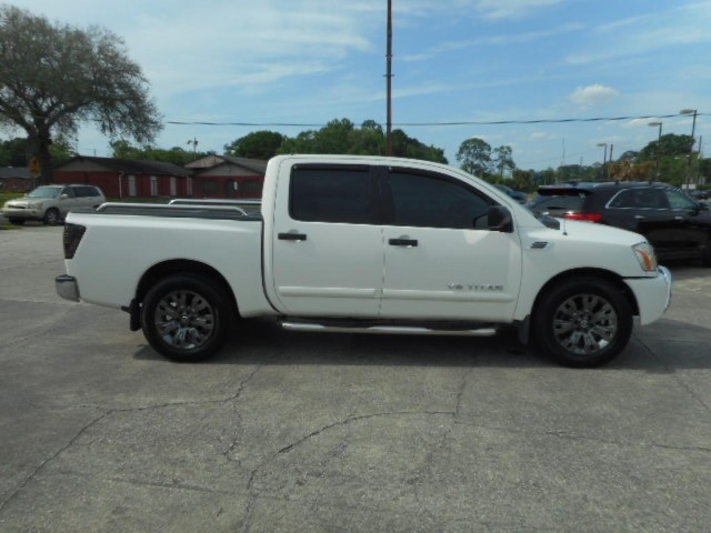 2010 WHITE NISSAN TITAN SE; LE; XE (1N6BA0ED7AN) , located at 10405 Abercorn Street, Savannah, GA, 31419, (912) 921-8965, 31.988262, -81.131760 - Photo#4